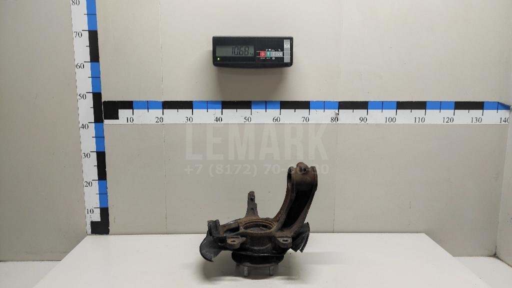 Кулак поворотный передний левый