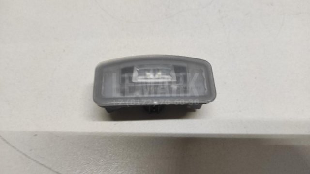 Фонарь подсветки номера