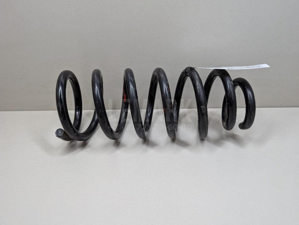 Пружина задняя