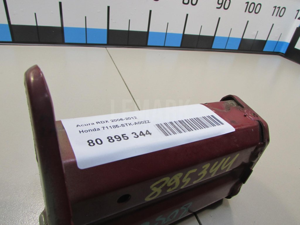 Кронштейн усилителя переднего бампера левый