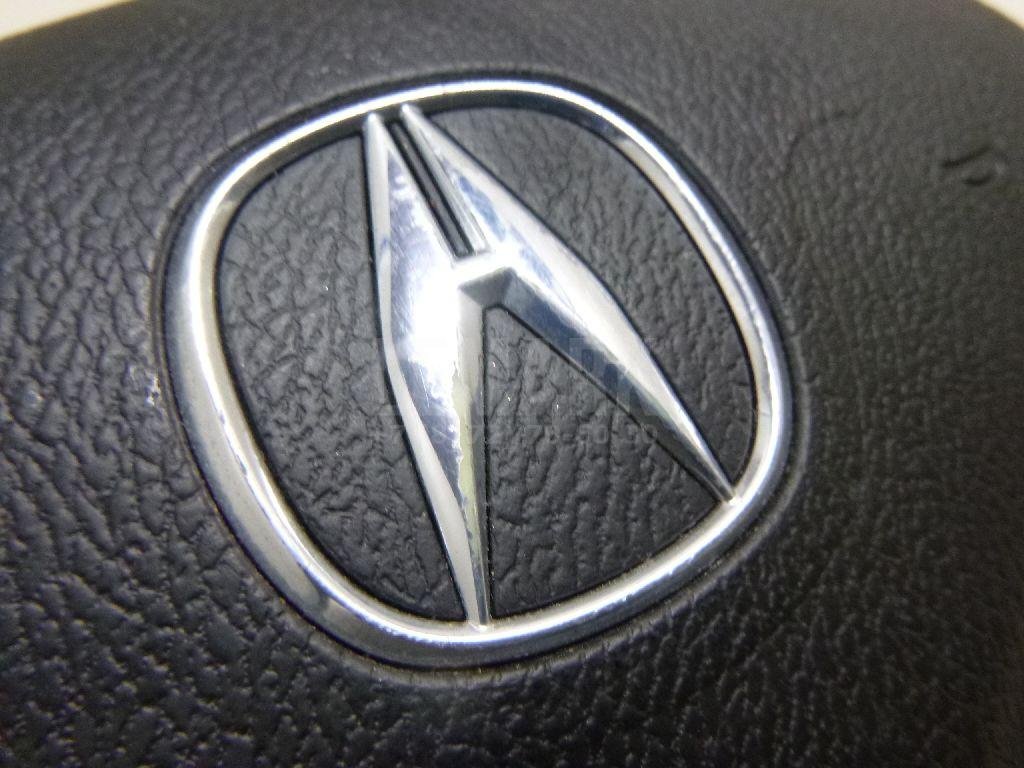 Подушка безопасности в рулевое колесо