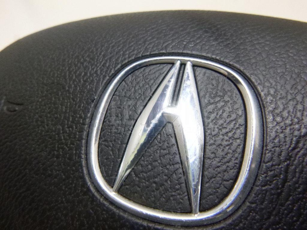 Подушка безопасности в рулевое колесо