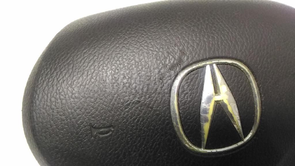 Подушка безопасности в рулевое колесо