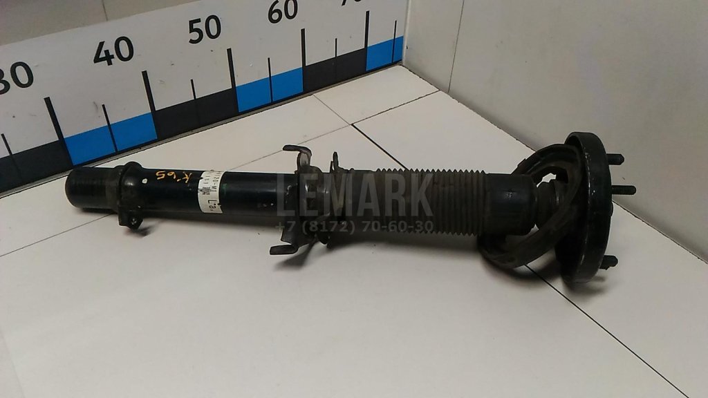 Амортизатор передний левый