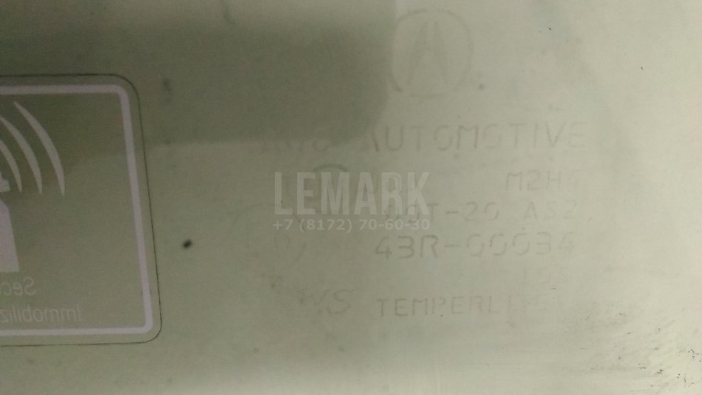 Стекло двери передней левой