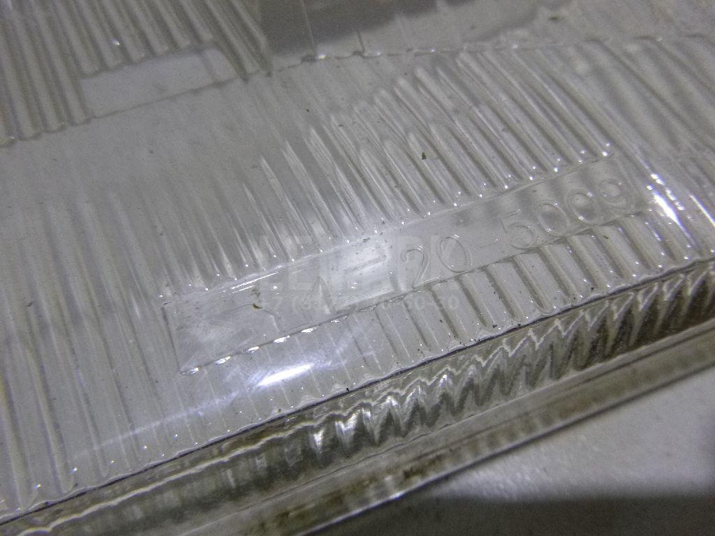 Стекло фары правой