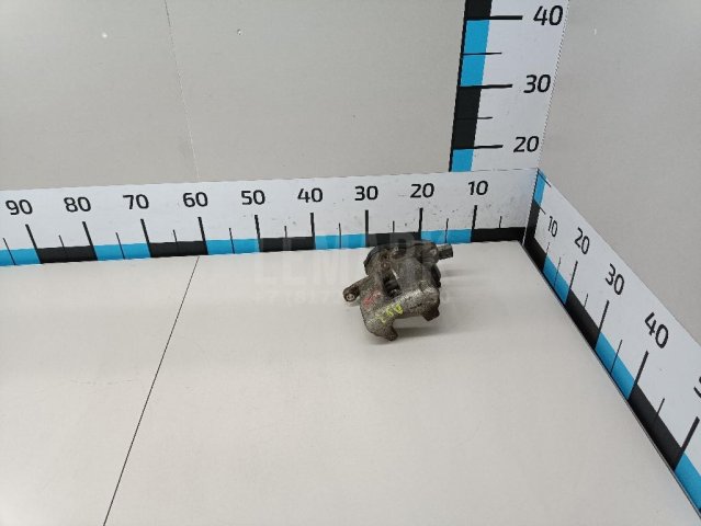 Суппорт тормозной задний левый