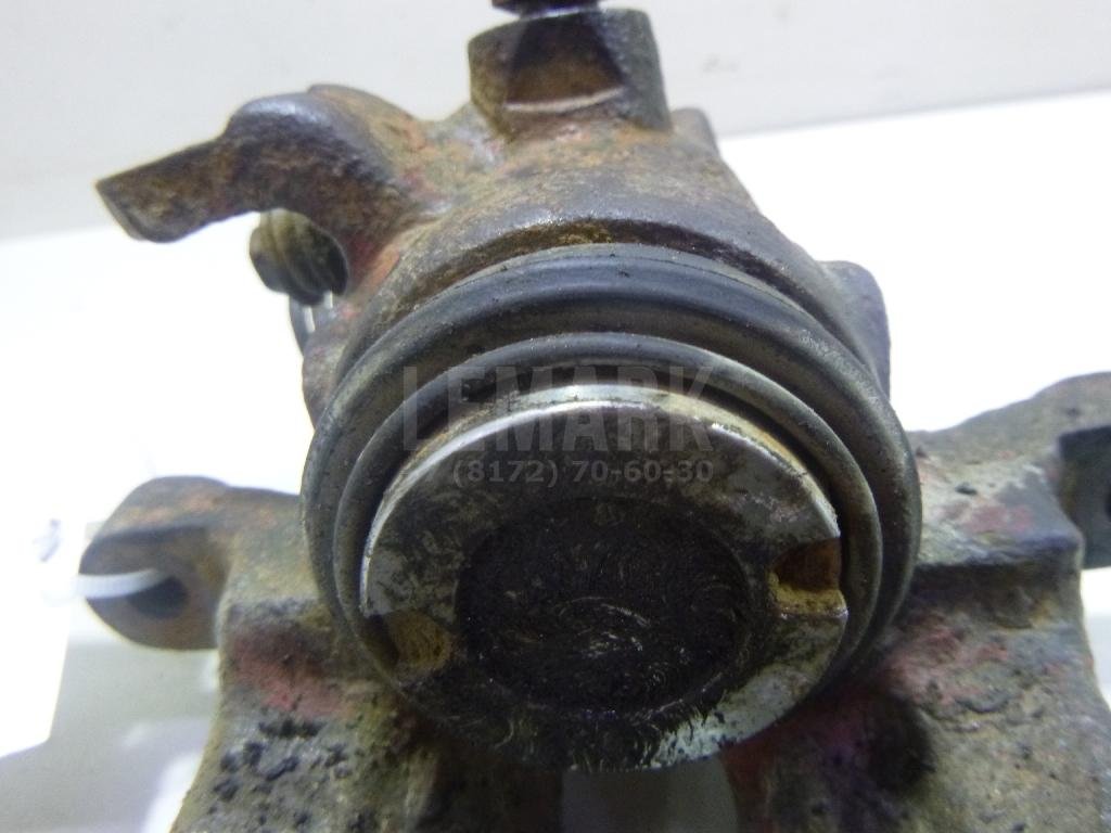 Суппорт тормозной задний правый