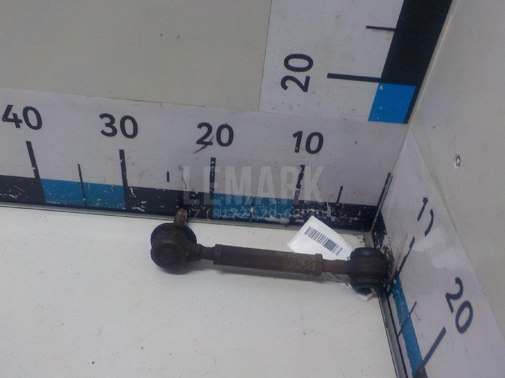 Тяга регулировки развала левая