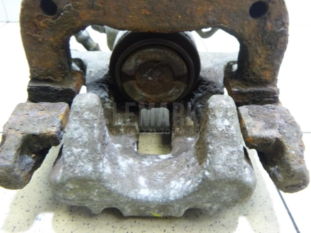 Суппорт тормозной задний правый