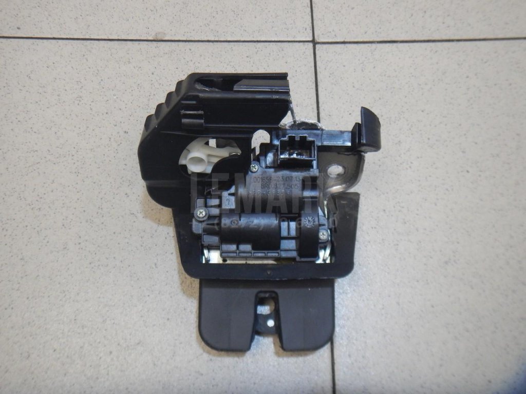 Замок багажника