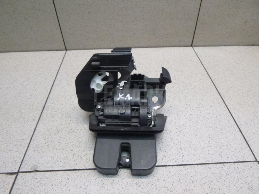 Замок багажника