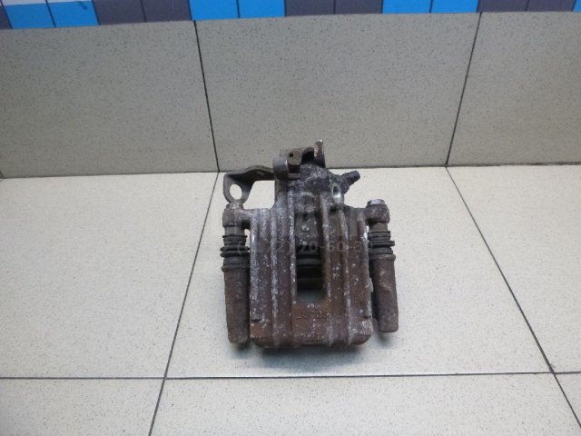 Суппорт тормозной задний правый