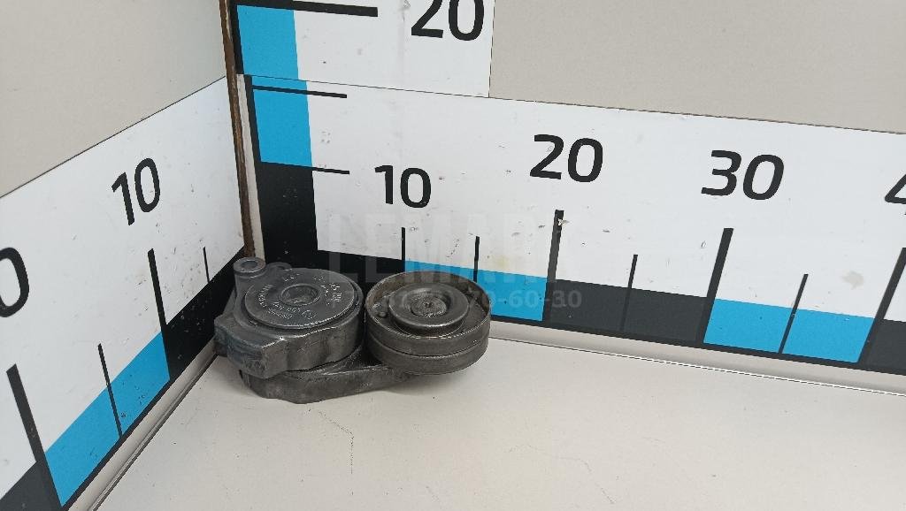 Ролик-натяжитель ручейкового ремня