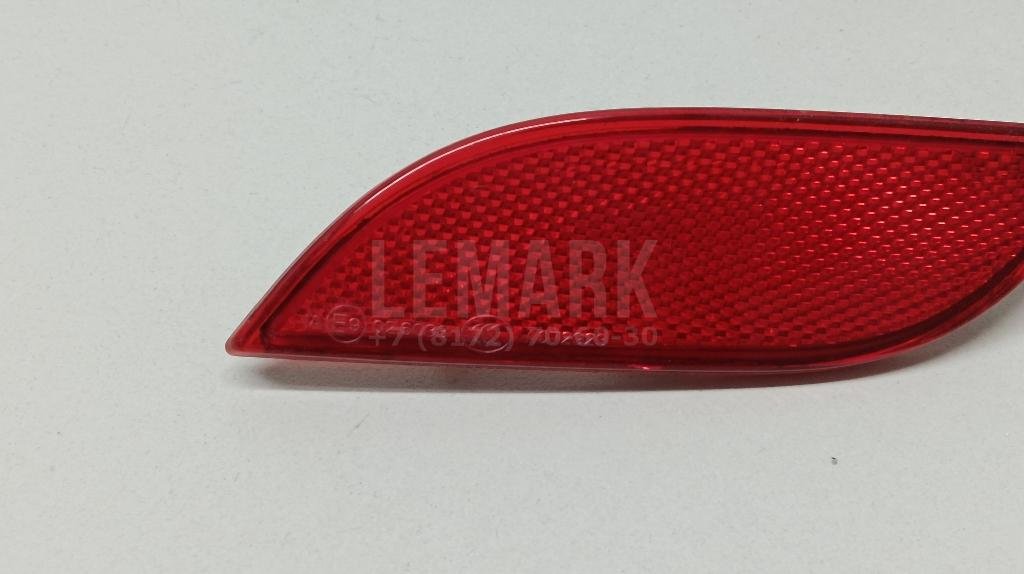 Отражатель в бампер задний левый