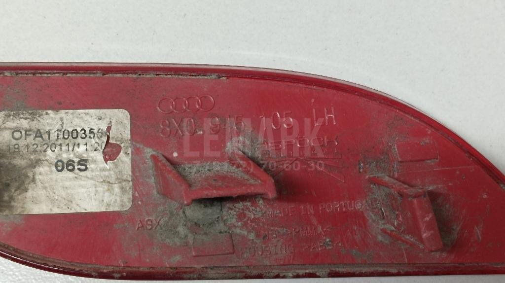 Отражатель в бампер задний левый