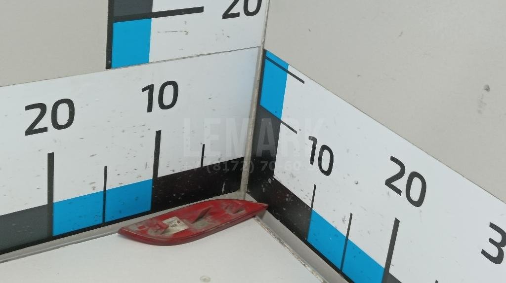 Отражатель в бампер задний левый