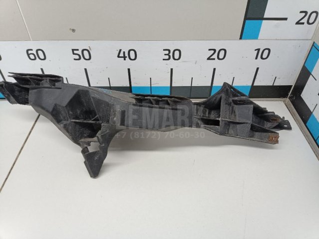 Кронштейн фар левый