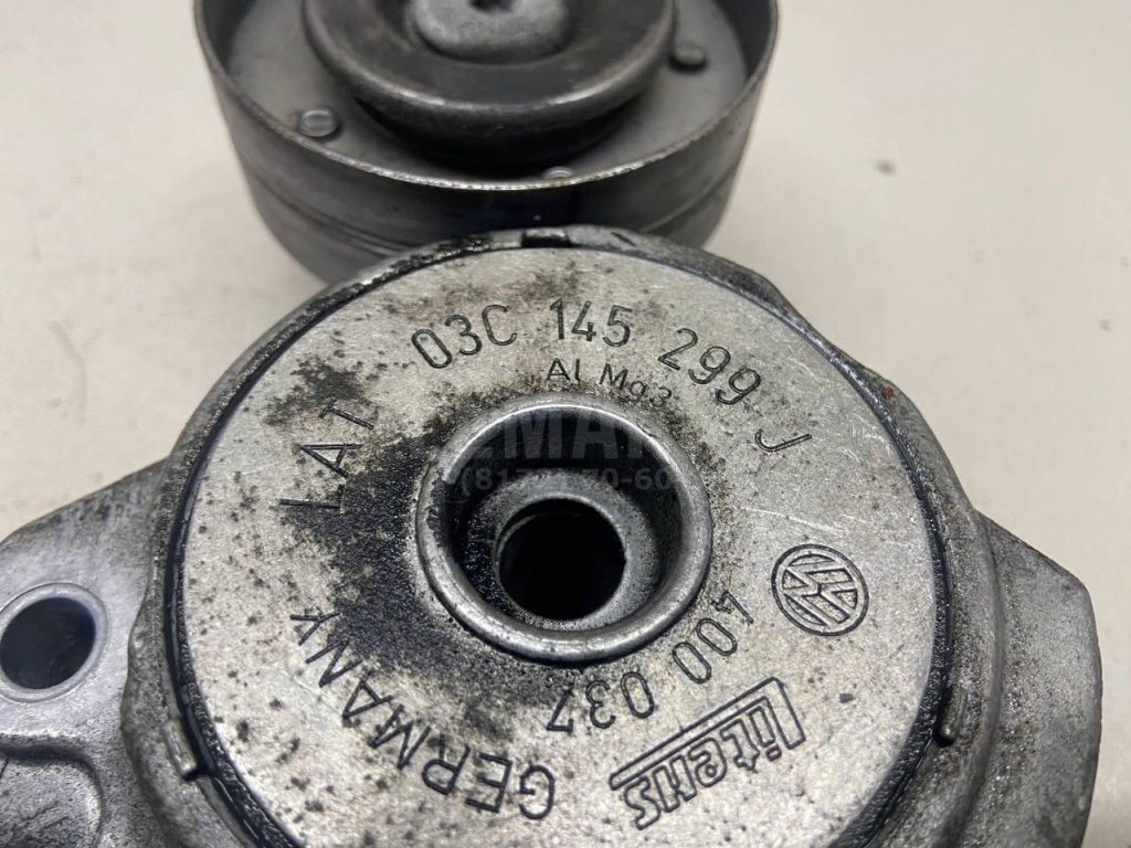 Ролик-натяжитель ручейкового ремня