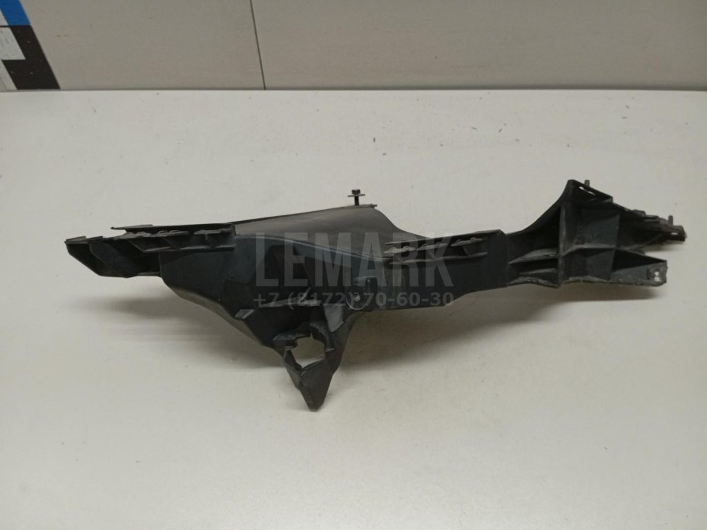 Кронштейн фар левый