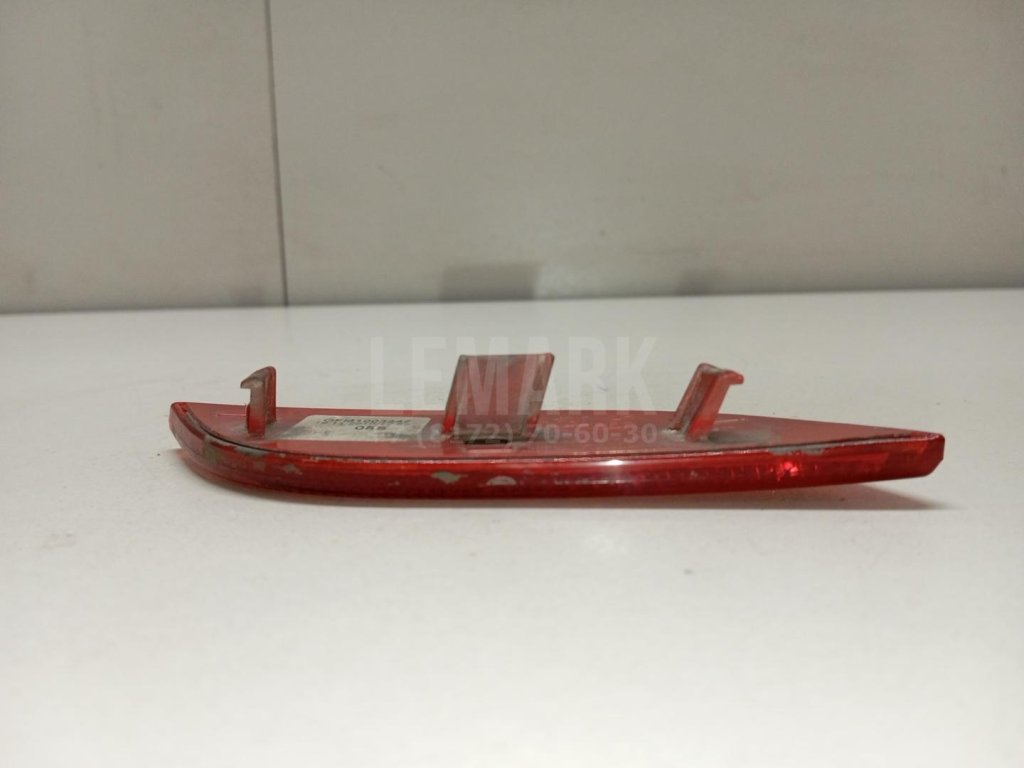 Отражатель в бампер задний левый