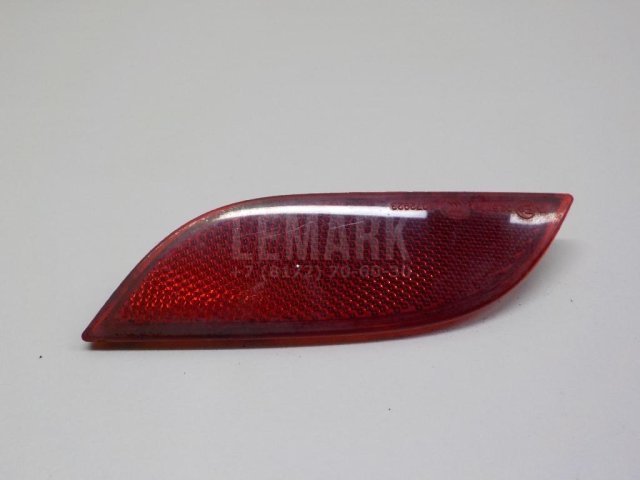 Отражатель в бампер задний левый