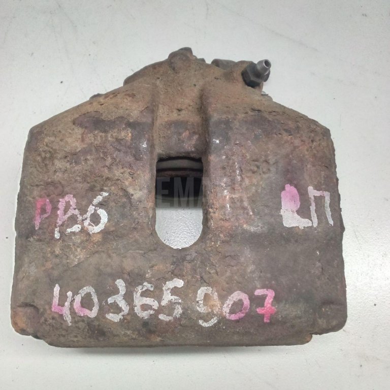 Суппорт тормозной передний левый