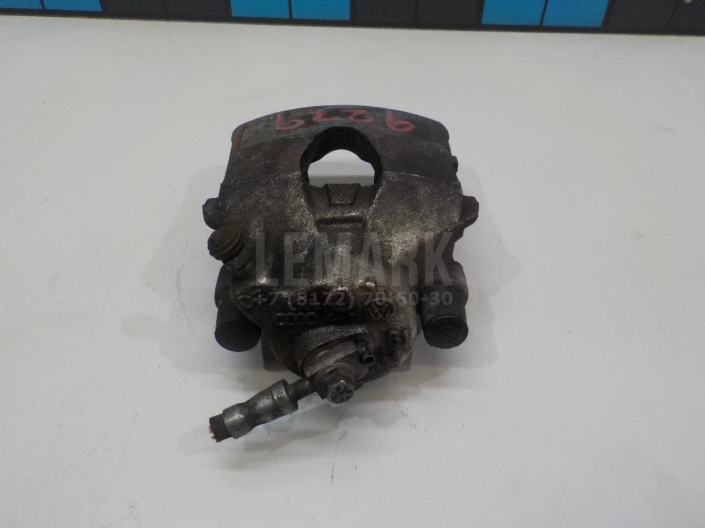 Суппорт тормозной передний левый