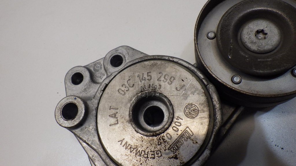 Ролик-натяжитель ручейкового ремня