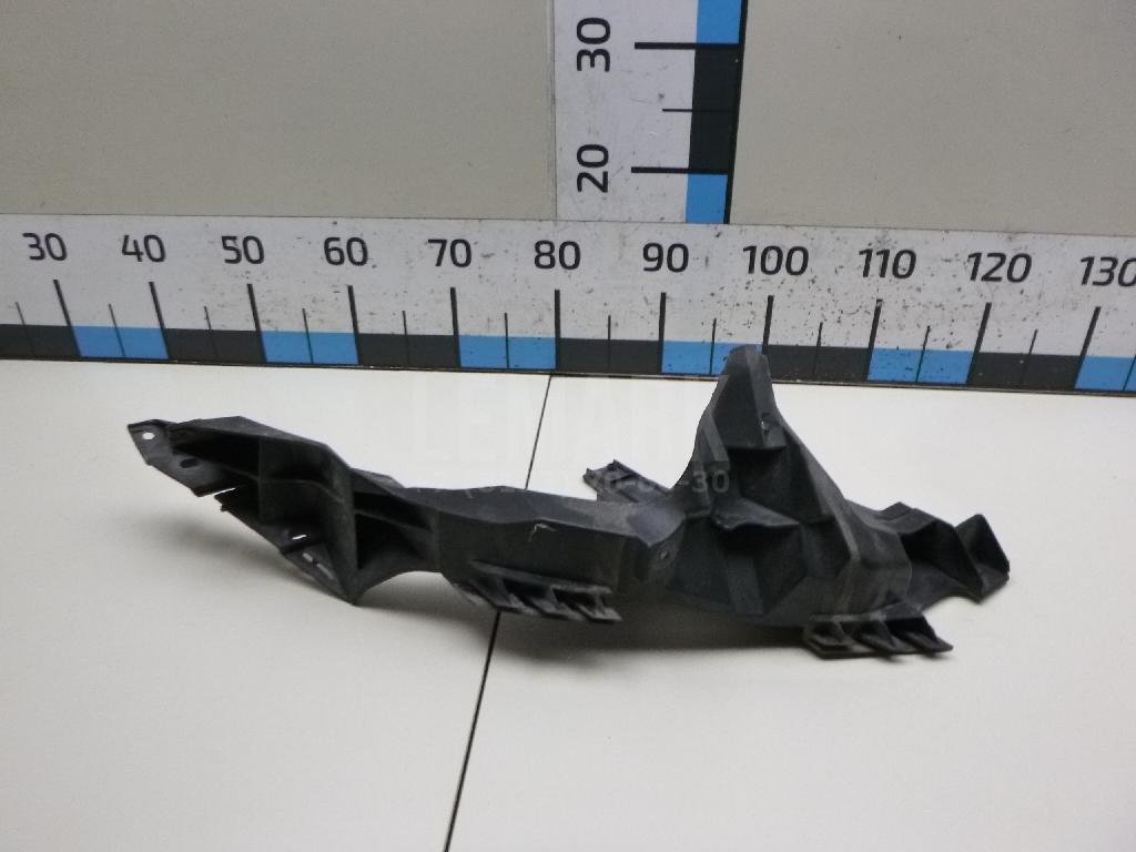 Кронштейн фар левый