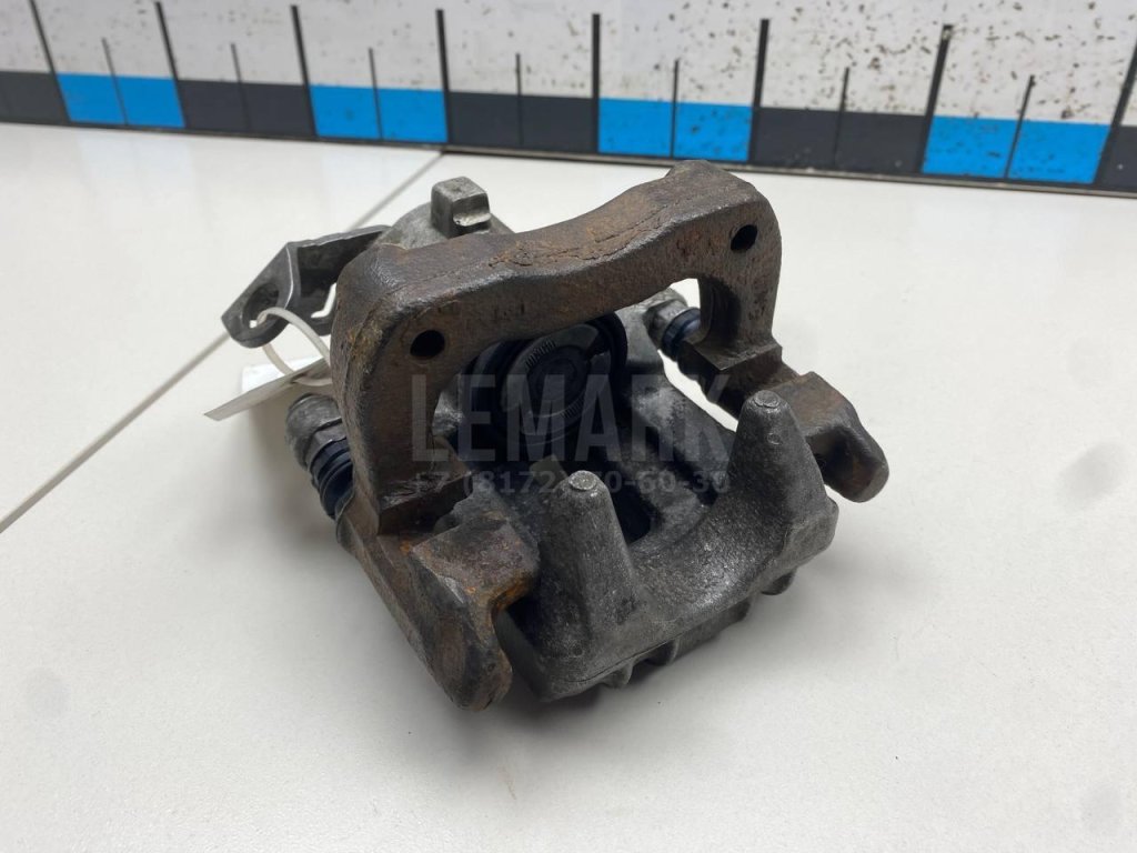 Суппорт тормозной задний правый