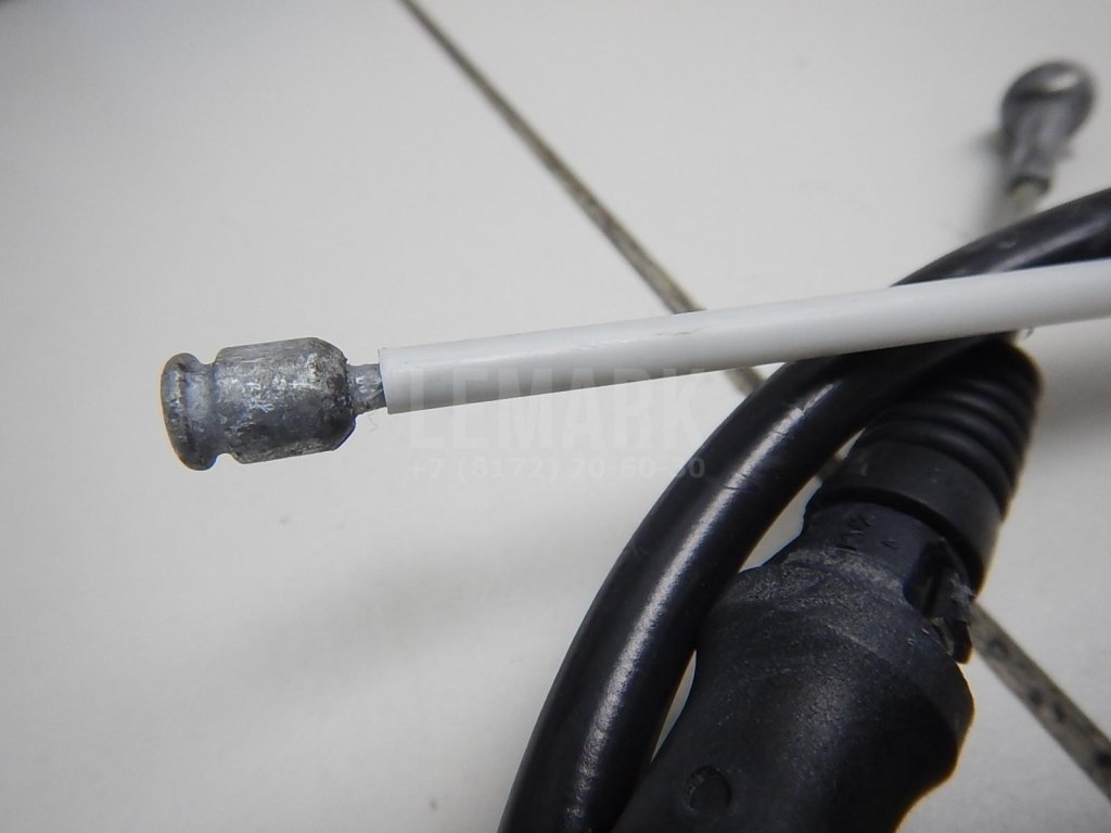 Трос стояночного тормоза