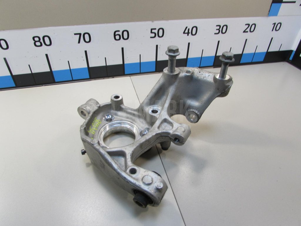 Кулак поворотный задний левый