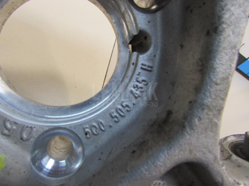 Кулак поворотный задний левый