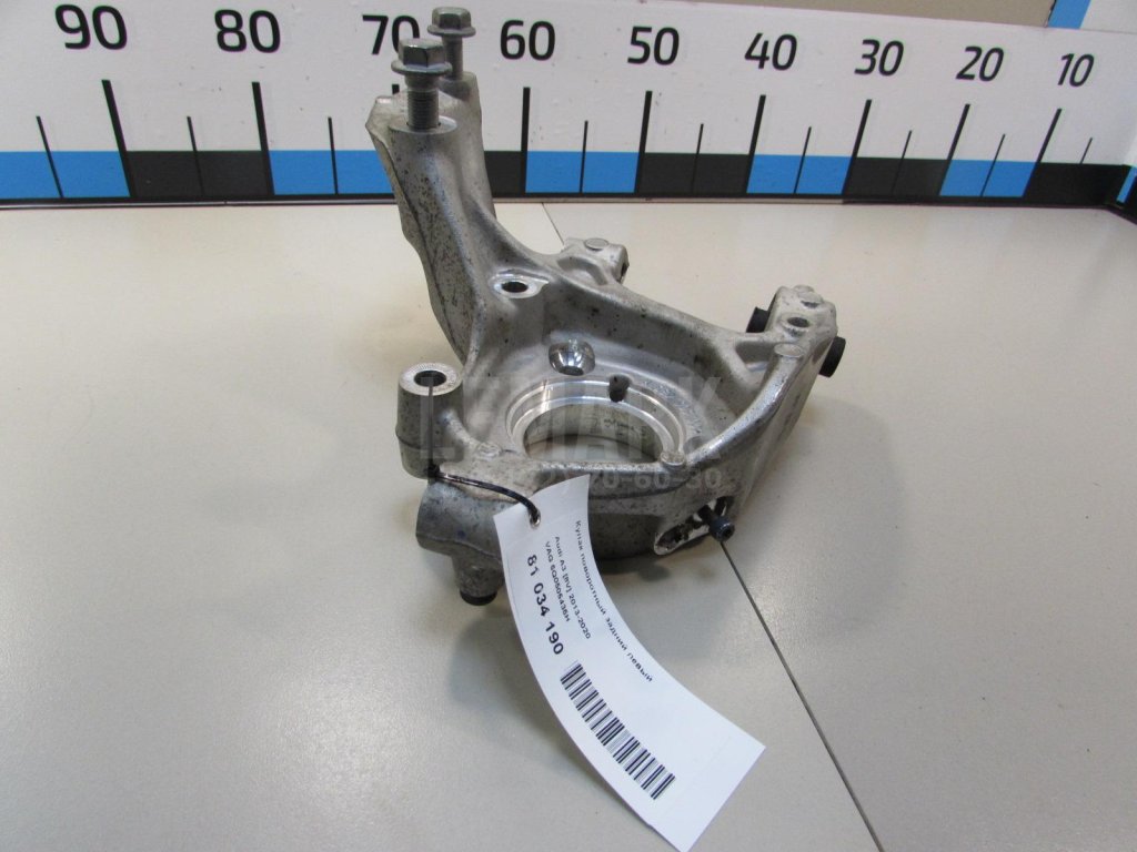 Кулак поворотный задний левый