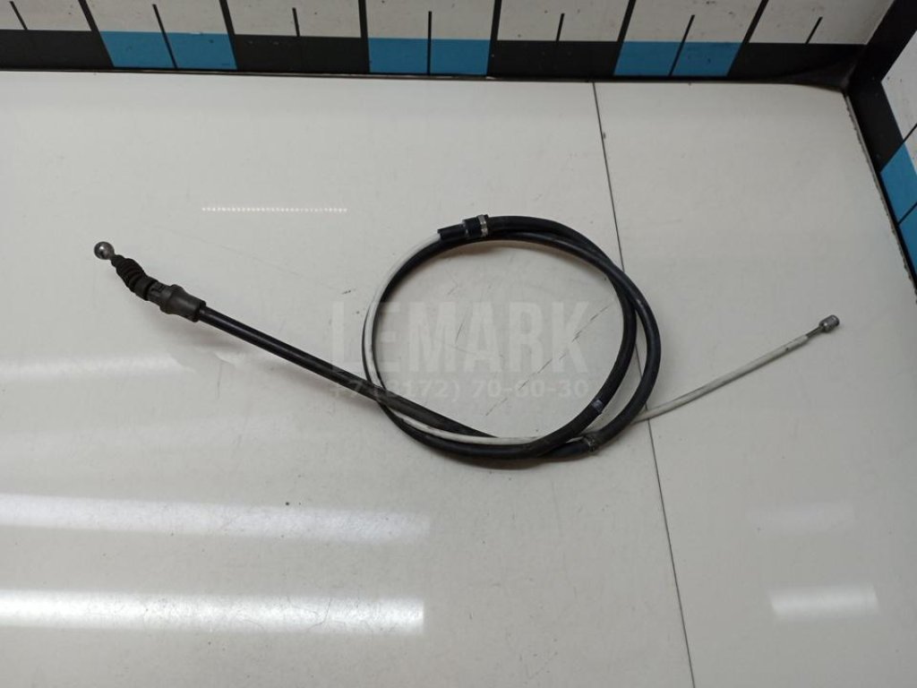 Трос стояночного тормоза