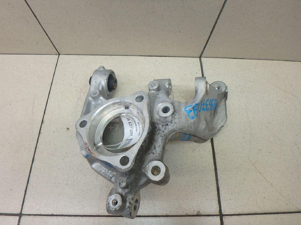 Кулак поворотный задний левый