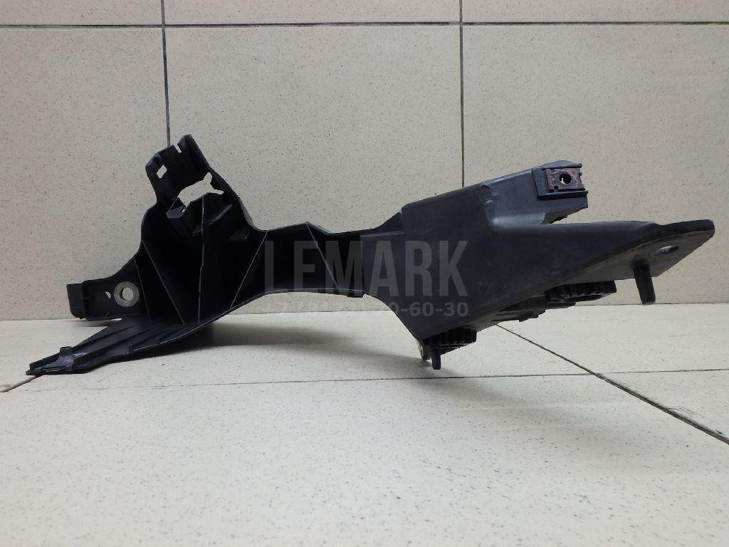 Кронштейн фар левый