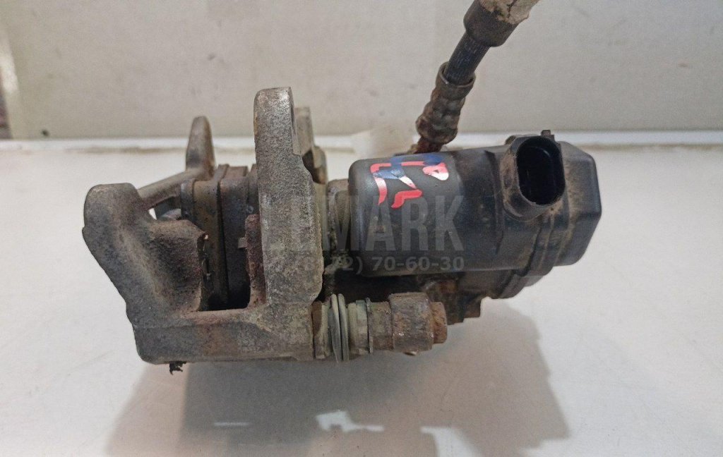 Суппорт тормозной задний правый