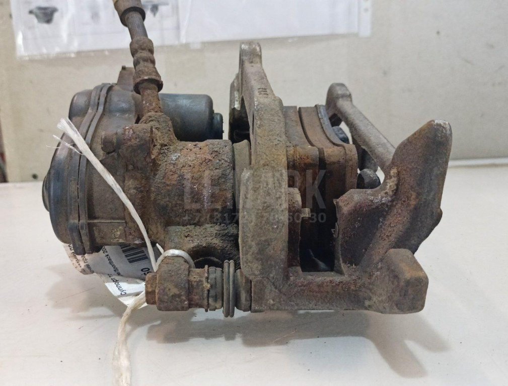 Суппорт тормозной задний правый