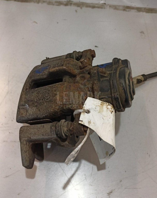 Суппорт тормозной задний правый