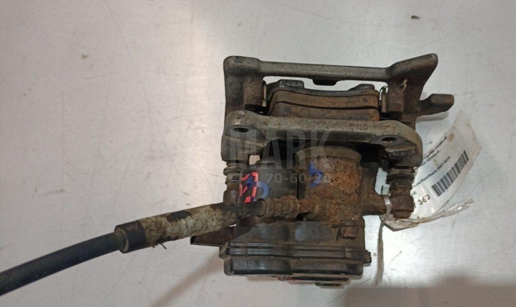 Суппорт тормозной задний правый