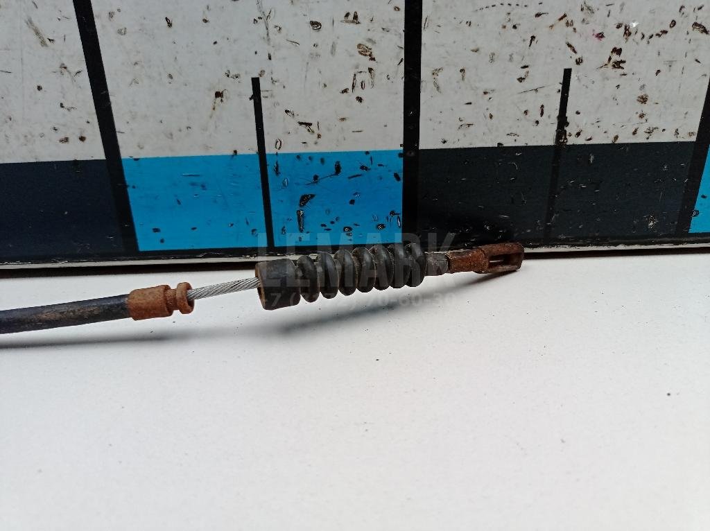 Трос стояночного тормоза