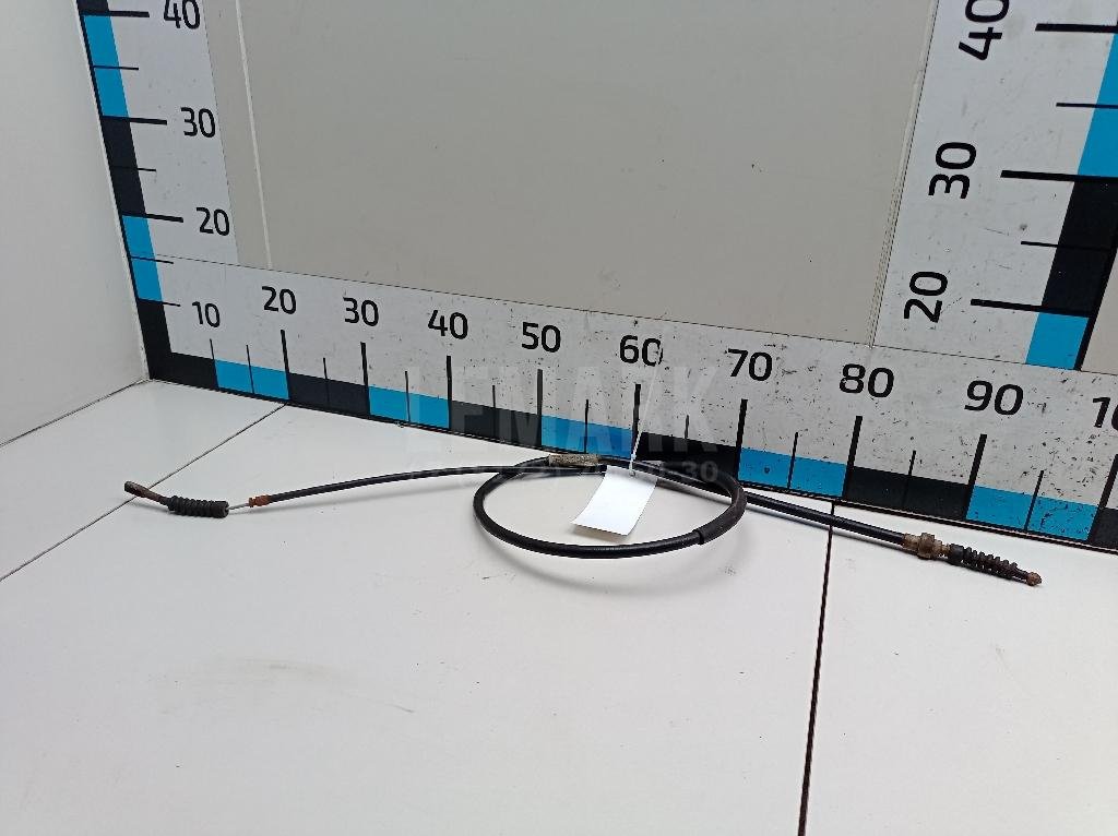 Трос стояночного тормоза